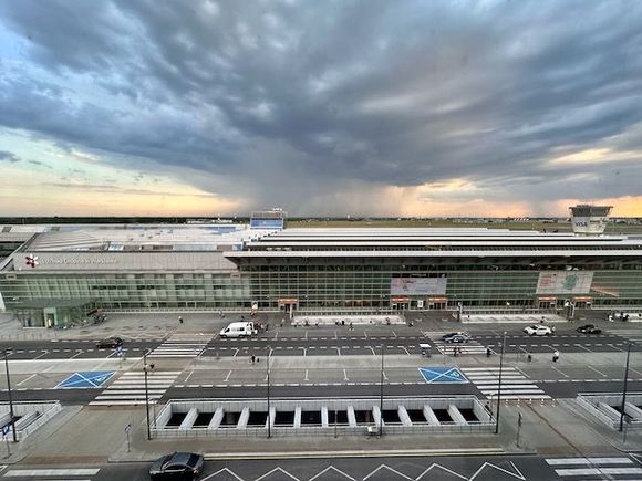 View from the suite over the airport (with rain shower in the distance)