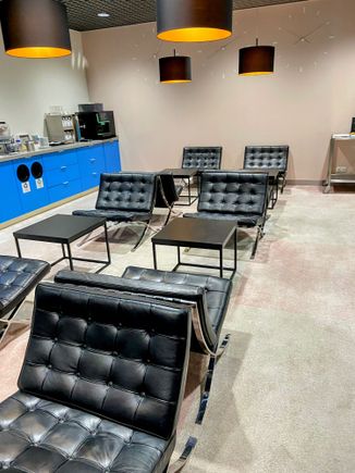 I managed to find a moment where this section was empty. I’m not the biggest fans of Barcelona chairs, they look great, but not that good to sit in. Eames chair is much better in that regard.