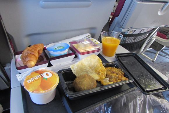 It was too bad that we were not that hungry on this Doha-Sofia flight because a) the plane was pretty empty and b) the flight attendants were very friendly and kept pampering us with food and juice. I did help myself to three cups of mango (my favourite) juice, only one of which is pictured here!