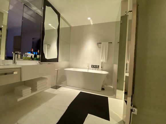 Decent bathroom with window into main room area