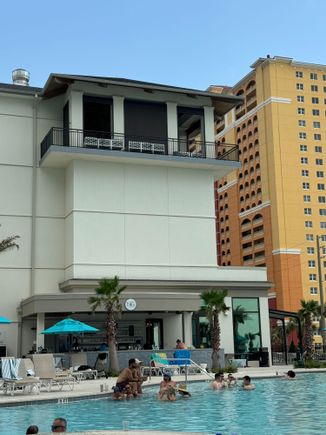 Upstairs outdoor area was described as a "common area" with bar service. However, the bar isn't staffed full time. 