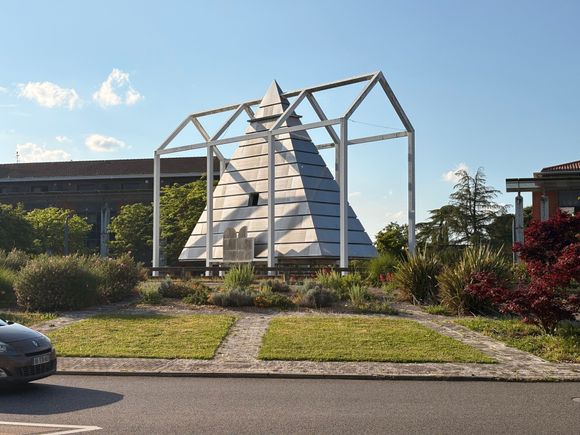 According to Wikipedia and Google Translate, this is "The Pyramid of the Bicentenary of the French Revolution"