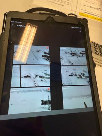 This ended up being 6+ hours. They showed me this webcam footage of our aircraft stuck in snow in Sapporo. There’s a JAL lounge in the domestic terminal, but it’s drinks only (plus popcorn). At least they had a beer machine and massage chairs!