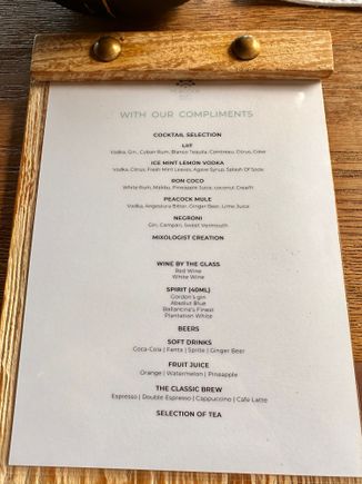 Here is the current drinks list for happy hour at Peacock Alley. 

The staff were constantly asking if you wanted another drink and very knowledgeable on the cocktails 

