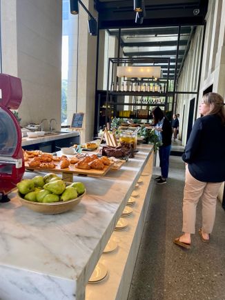 Breakfast buffet, pastry, fruit and vegetable section 