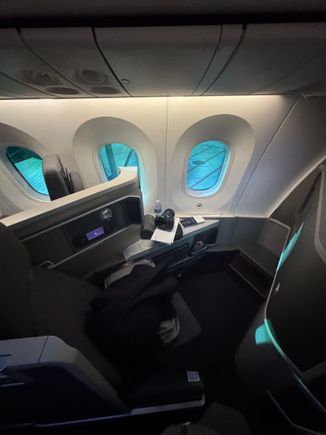 My seat for the next 10 hours….yep, the dreaded Zodiacs….but I had to do work on the entire flight; so hopefully I didn’t bother my seat mate much.
