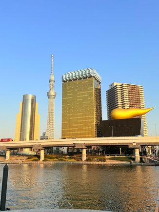 See the building that kind of looks like a beer? That’s where we’re going.
