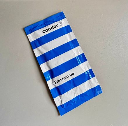 Condor branded hand wipe from the forward lavatory 
