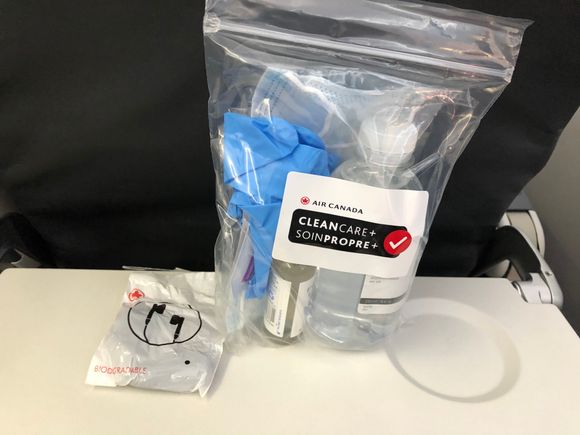 The now-standard AC care package + (free!!) headphones.