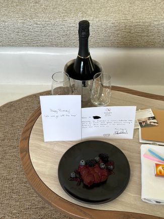 Bottle of Prosecco and chocolate cake for a birthday stay at the Mystique in Santorini. We also received several treats in our room along with other glasses of wine. It was one of the most fantastic hotel stays we’ve ever experienced. 