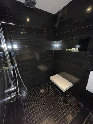 Here is the shower area. Water pressure was great in my experience. Took a little bit of time to become super hot as I like it.