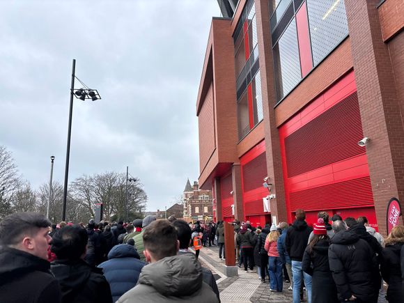 It was cold! Waiting in line whilst the Wolves fans wandered past (out of shot) with familiar chants about fans of Liverpool.