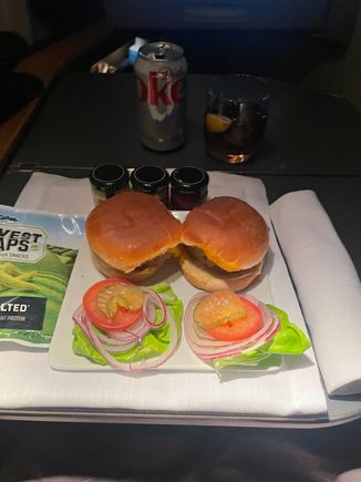 After a great sleep of nearly 8 hours, I ordered the wagyu sliders were the big winners as far as food was concerned on this flight. They were warmed to order with all of the appropriate fixings, and very tasty...