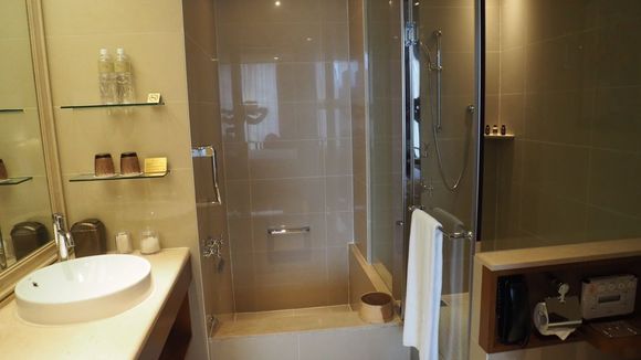 Japanese style bathroom. The sunken tub is an interesting feature