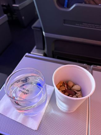 Nuts in a paper cup - supposedly the ramekins were too hot