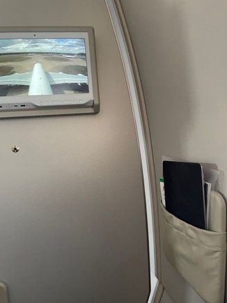 Trip 1 - The bulkhead & TV screen (you need very long arms) NB. There is no remote control for the TV in any of the PE seats.