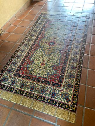 I particularly liked this tile "rug" near the front of the main house.