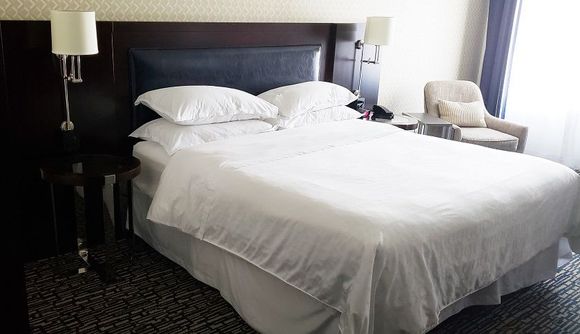 Electric outlets on each side of bed