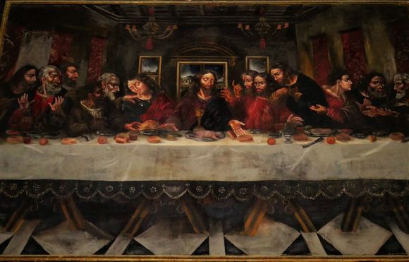 The Last supper by Juan de Sevilla Romero (1643 - 1695).
Notice there is no knife on his painting, as to da Vinci's, where there is.  
