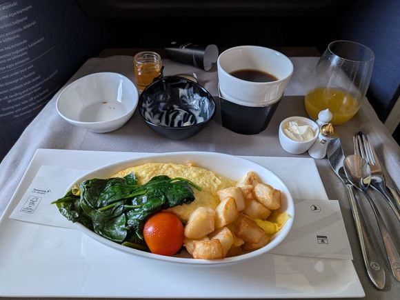 Omelette was probably on the rubbery side but acceptable. The potatoes however were downright atrocious. The worst I've had anywhere. They had a buttery flavor but they were drier than actual cardboard. This was the only food item I was served that I couldn't even eat half of (I do not like to waste food, especially on flights, so if I don't finish something it's pretty bad). I did appreciate the constant coffee refills however.

In the future I might ask if I can get the Y breakfast if availabl