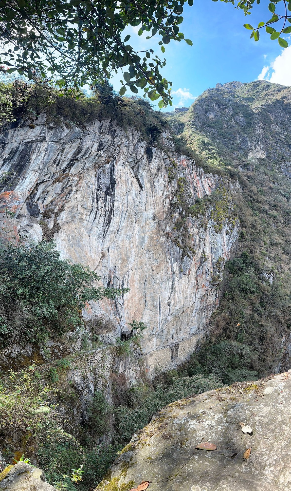 Inka Bridge carved on a sheer cliff wall