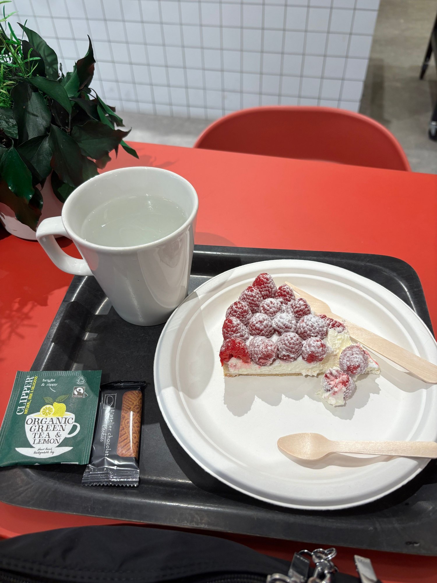 Green tea and a raspberry cream tart.