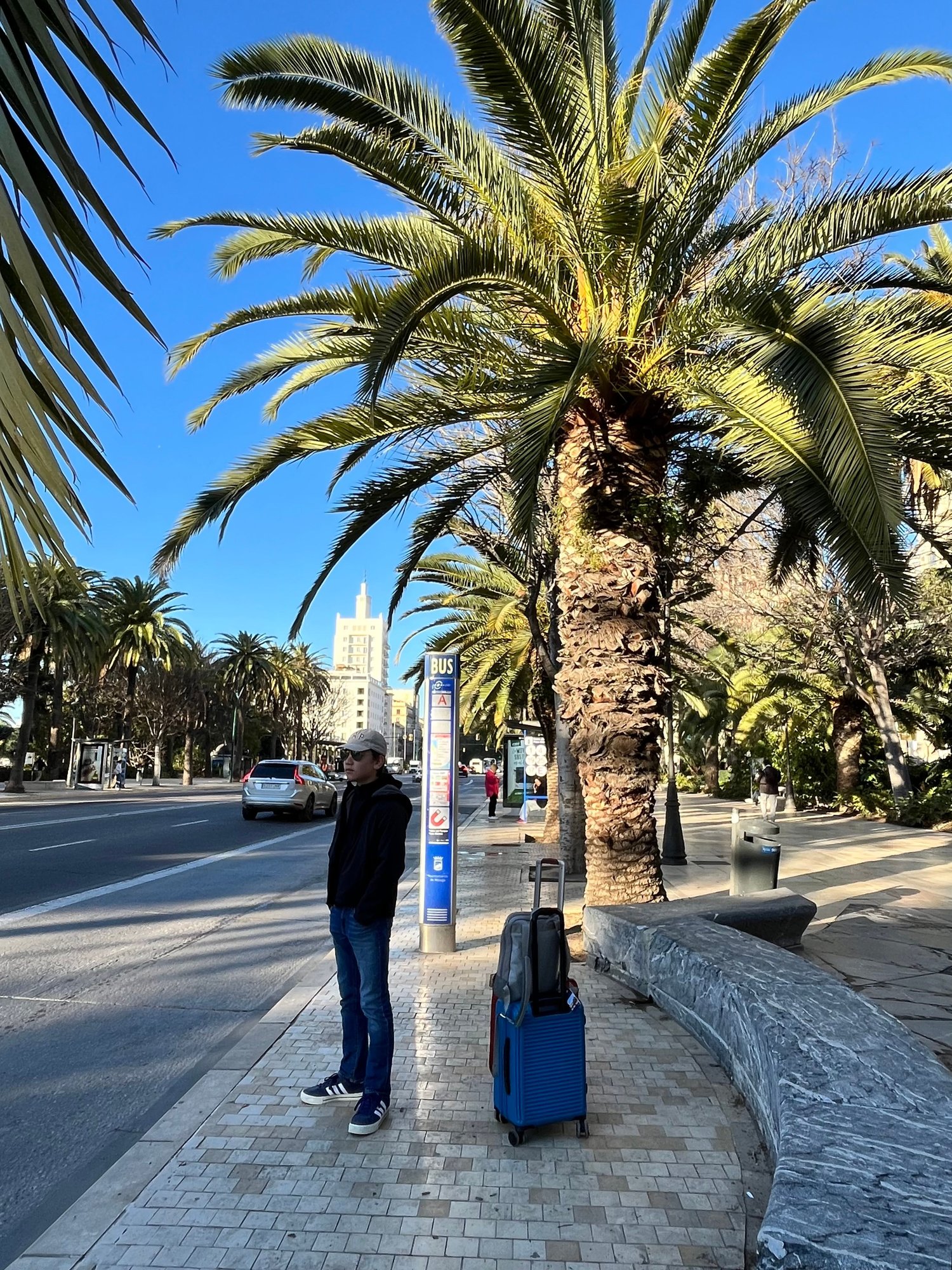 Another beautiful day in Malaga! Waiting at the bus stop for the Airport Bus
