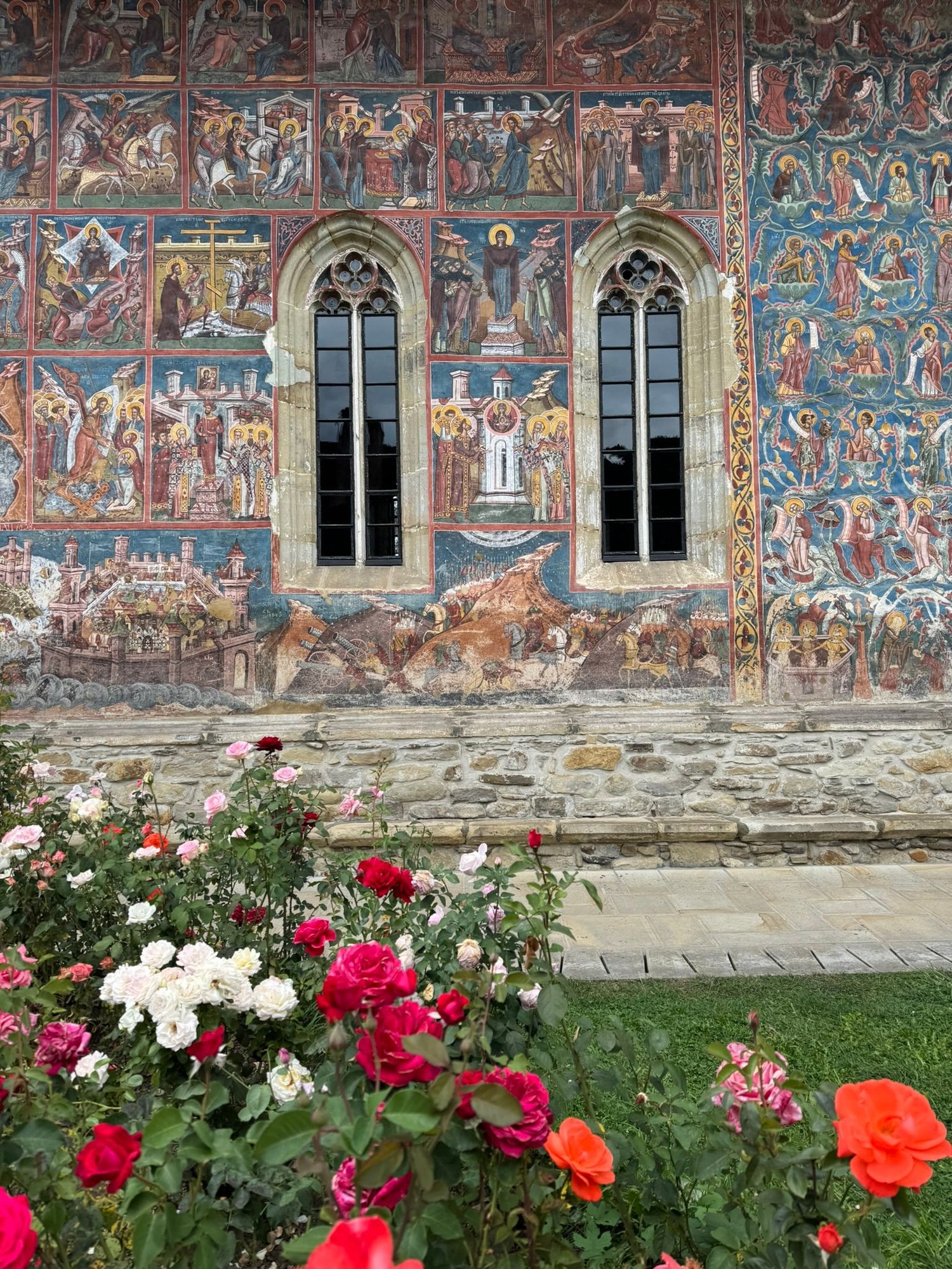 The paintings are set on a beautiful blue background. 