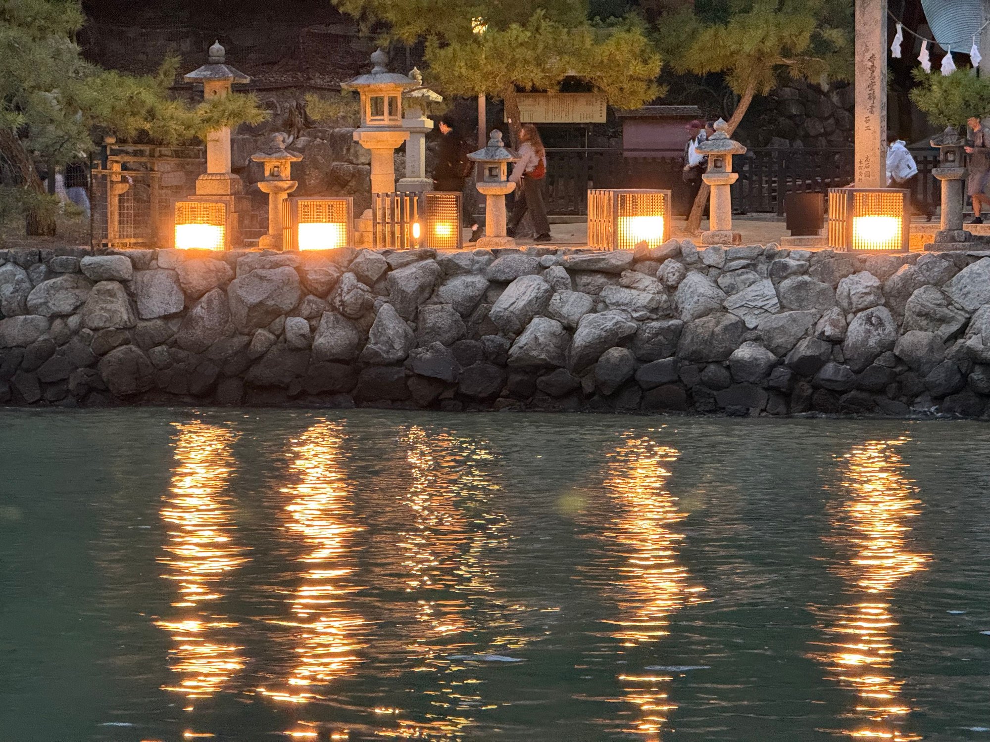 lanterns illuminated at Itsukushima in the evening