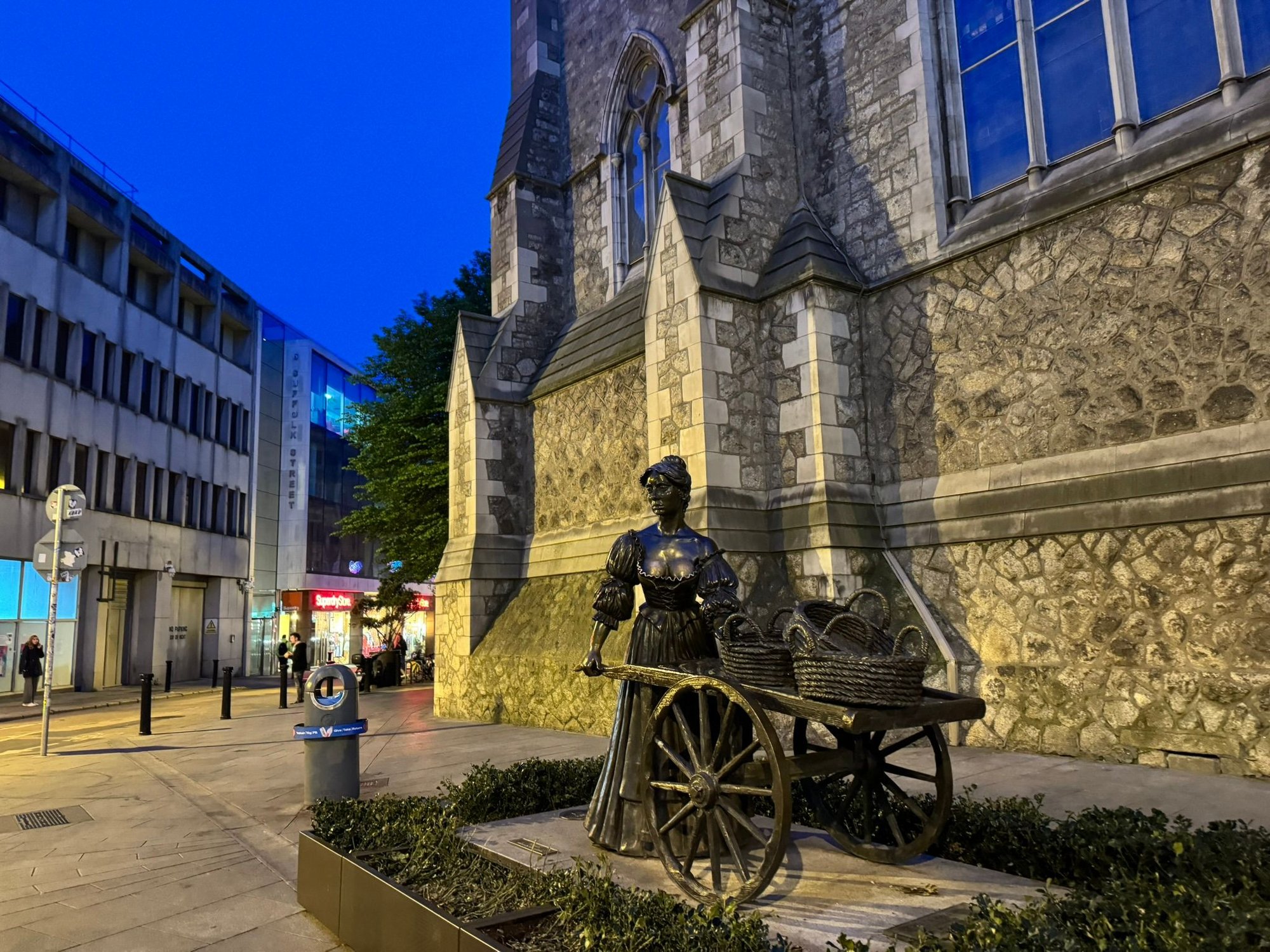 The famous Molly Malone statue. She is a famous figure from Irish folklore.  She is a fishwife who plied her trade on the streets of Dublin. 