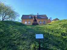 Skansen, one of the oldest storehouse buildings in Tromso, surrounded by remnants of medieval fortifications