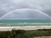 Really bright rainbow over the beach late this afternoon.