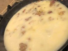 
Chicken stock and cream added to skillet with bacon and veg mixture toasted with flour