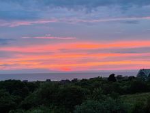 
Here’s a pretty evening sky after a cloudy, humid day. 

Arrived at the beach yesterday to find the AC isn’t working. Hot as Hades given the house has been shut for a few weeks. Plus no fans since we don’t need them.  No one is returning my calls and my usual guy retired. I’m trying to “offer this up” - the Catholics here will know what I mean, but I confess to being a bit cranky and glad Mr. Gruezi isn’t here because he hates the heat too. 

