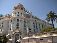 The Promenade des Anglais has been a Nice landmark, a popular place for a stroll with gorgeous views of the sea. The paved walkway stretches for 5 kilometers and is known by locals as "La Prom". It was paid for by wealthy British people who used to spend their winters here, away from the harsher seasonal weather in England. This fact is recognized in the promenade's name.
One side is lined with big hotels such as Negresco, luxury apartment blocks, casinos and fabulous restaurants.