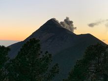 Fuego erupts again just before sunrise.