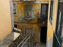 Walking down stairs in medieval Porto
