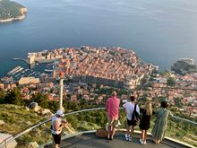 We rode the 3 minute cable car up the hill behind Dubrovnik for the sunset. The walled Old Town is below.
