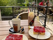 A busy cafe, tucked away in the back street on the river