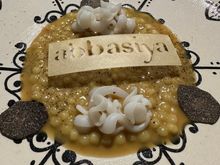 Fregola pasta (Sardinian). (I think I've written this before but so afraid of losing it now, as wifi is cutting out....). cooked in hen broth and topped with ribbons of calamari "pasta" and shaved black truffles..