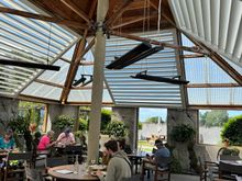 We dined in this light-filled covered patio dining area because it was breezy. There are large open windows, so you feel like you are outdoors.