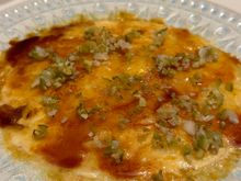 I'd never had an ensaladilla (typical Spanish cvcild salad that includes potatoes and other things) with a bruleed crust before; the toque of Chef Quique Dacosta,  who has earned 3 Michelin starts tag his Denia flagship) and under whose helm the restaurant operates