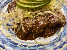 A breakfast of enchiladas with mole poblano hits the spot! 