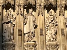 The person depicted in the middle of this frieze is Martin Luther King, I am not fibbing.