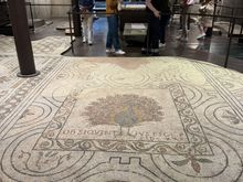 There are large fragments of mosaic flooring