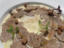 Potato soufflé with an egg and truffles.  I am still dreaming about this dish!