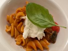 Fusillone with eggplant, Datterino tomatoes, and stratciatella cheese--also a half portion. (we each had a half portion of two different pastas)