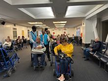 Non ambulatory passengers waiting for a "push" to immigration and baggage claim.