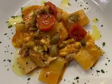 Paccheri alla Siracusana (capers, olives, cherry tomatoes, fish)