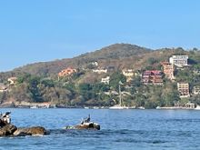 Looking back at Zihua.  In the top middle on the left is a red building, it's a Worldmark timeshare and that's how we discovered Zihua.